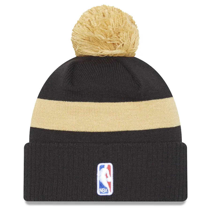 Toronto Raptors New Era Black and Gold City Edition 2022-23 Pom Knit Toque